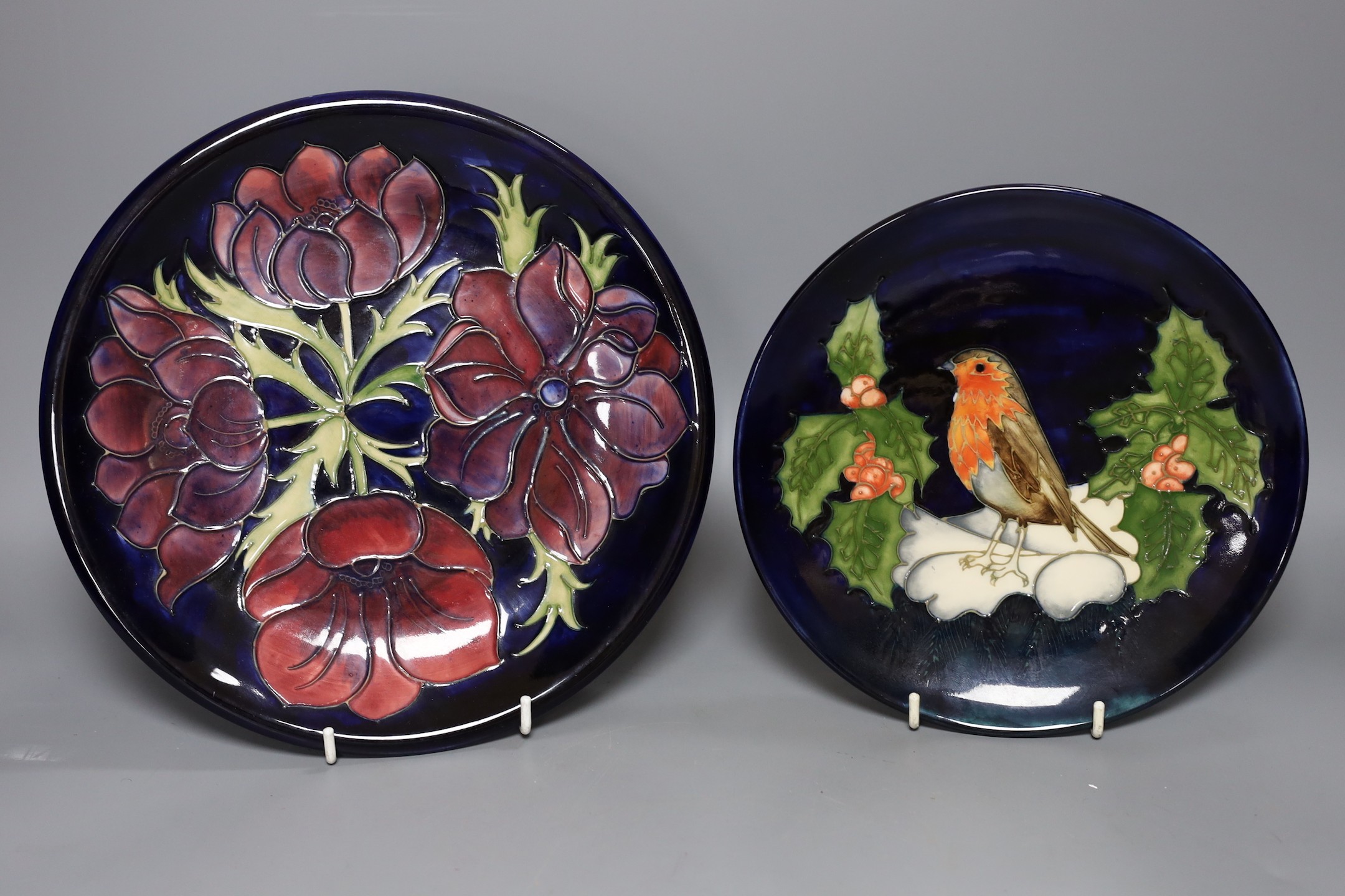 Five Moorcroft pottery dishes and a timepiece